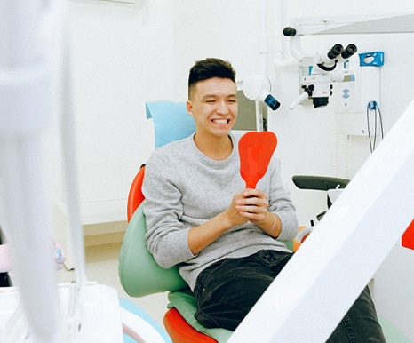 Man at dentist for a dental crown.