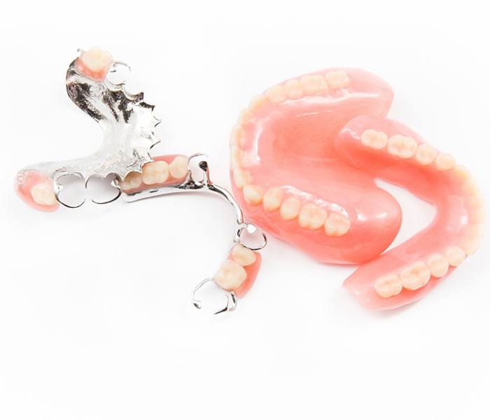 Closeup of different types of dentures in Spring 