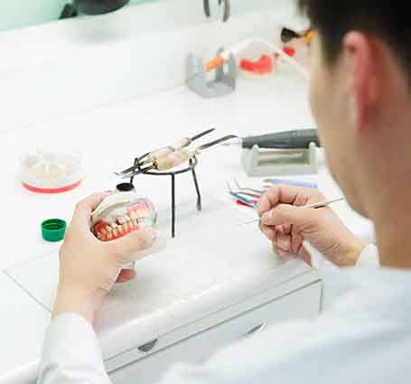 an assortment of different types of dentures