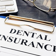 Dental insurance paperwork for the cost of Invisalign in Spring 