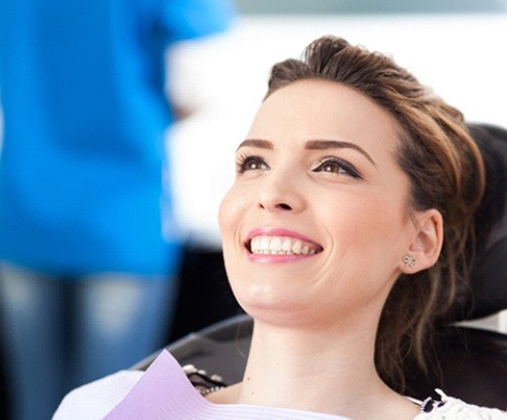 woman smiling in the dental chair