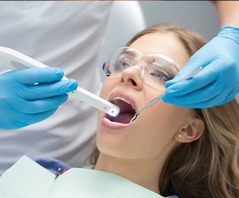 Dentist capturing intraoral images