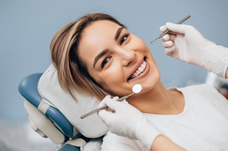 Woman smiling with dental implants 