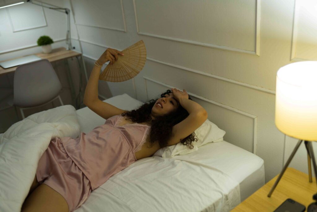 Woman too hot to sleep